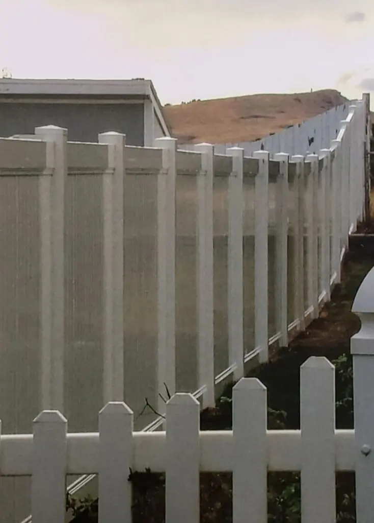 White vinyl fence