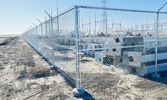 Chainlink fence surrounding commercial property Chainlink fence surrounding commercial property